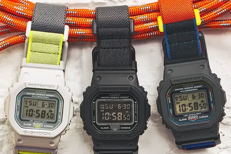 Годинник Casio G-Shock DW-5600MNC з еластичним тканинним ремінцем і магнітною застібкою Fidlock.